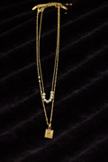 Collier double doré avec perles | Motif fleur
